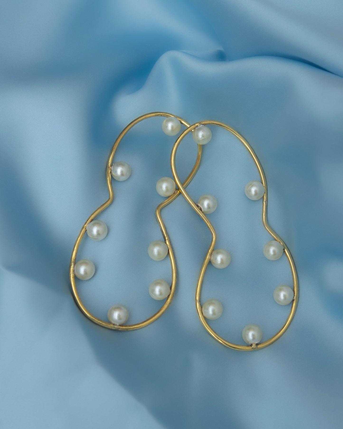 Boria stud earrings handmade from brass with pearl detailing