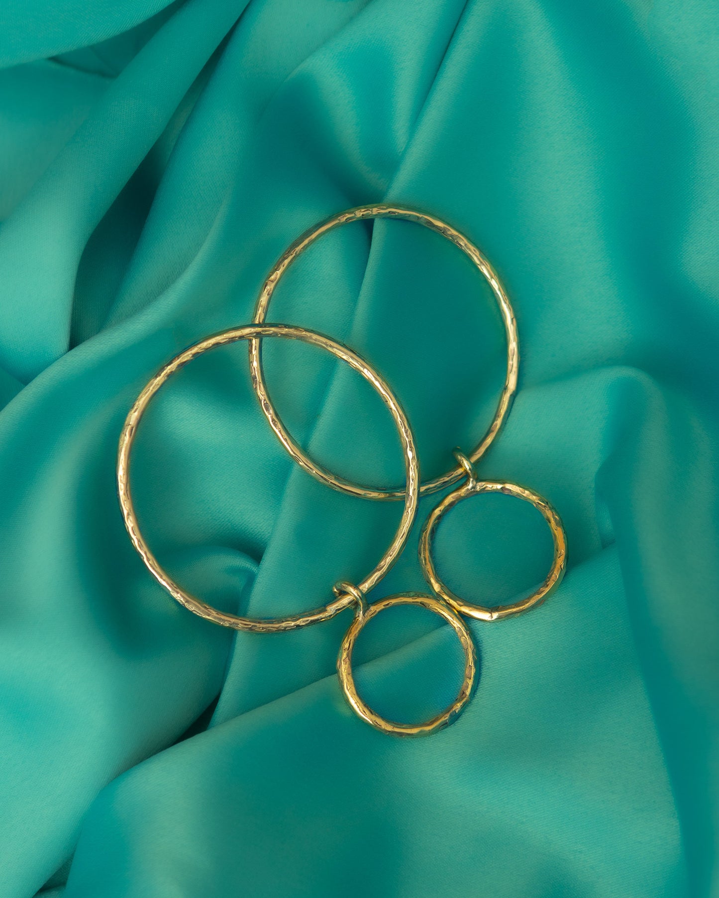 Sculptural double circle earrings crafted in Ghana