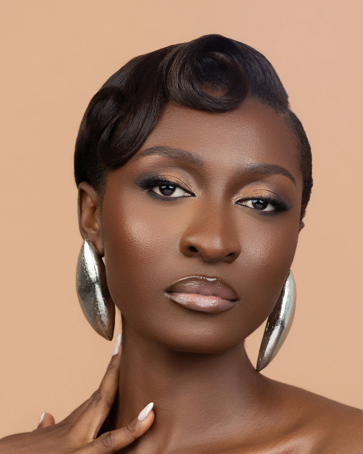 Pini silver calabash stud earrings, handmade in Ghana by Adjeley