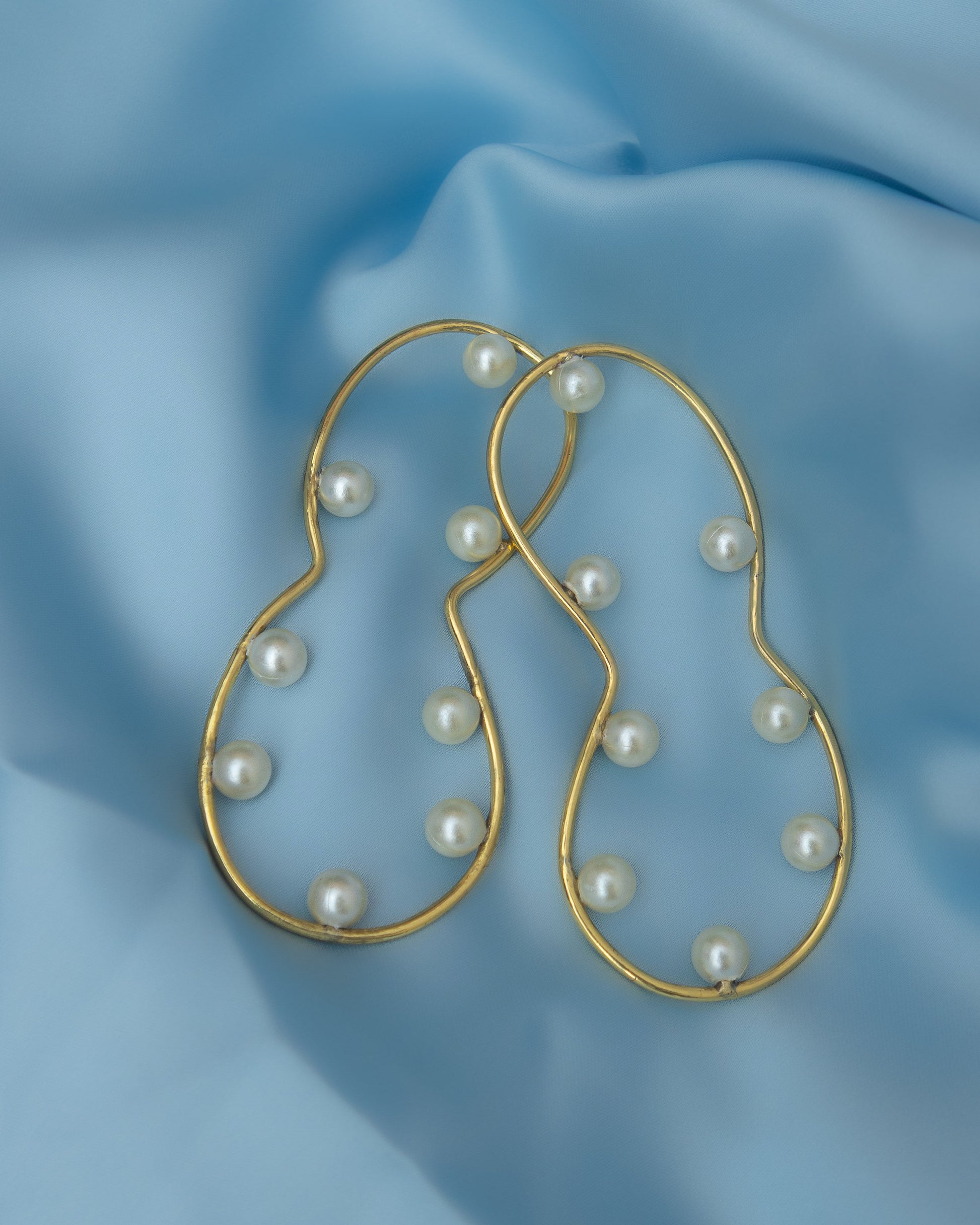 Boria stud earrings handmade from brass with pearl detailing