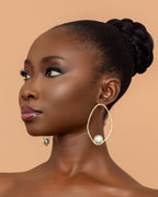 Handmade textured brass and pearl stud earrings by Adjeley Jewellery