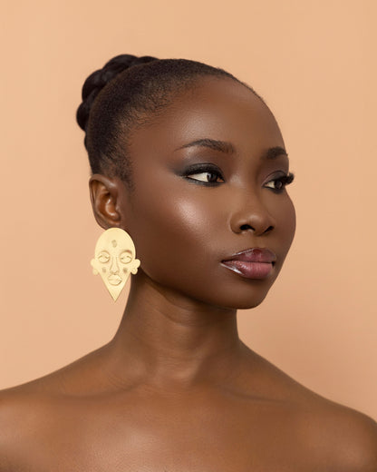 Esaaba stud earrings handcrafted from brass inspired by African masks