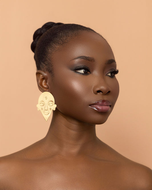 Esaaba stud earrings handcrafted from brass inspired by African masks