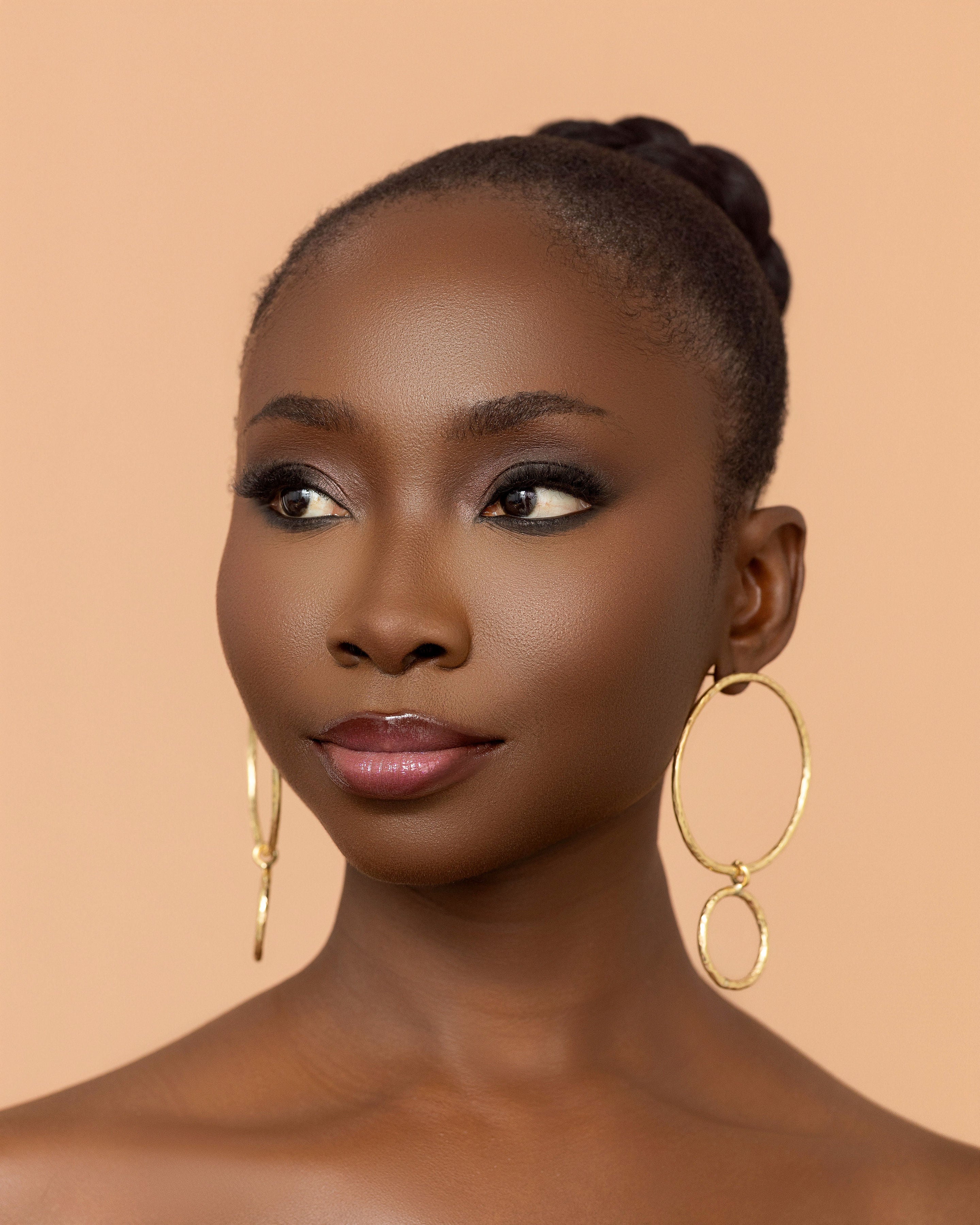 Handmade minimalist brass statement earrings by Adjeley Jewellery