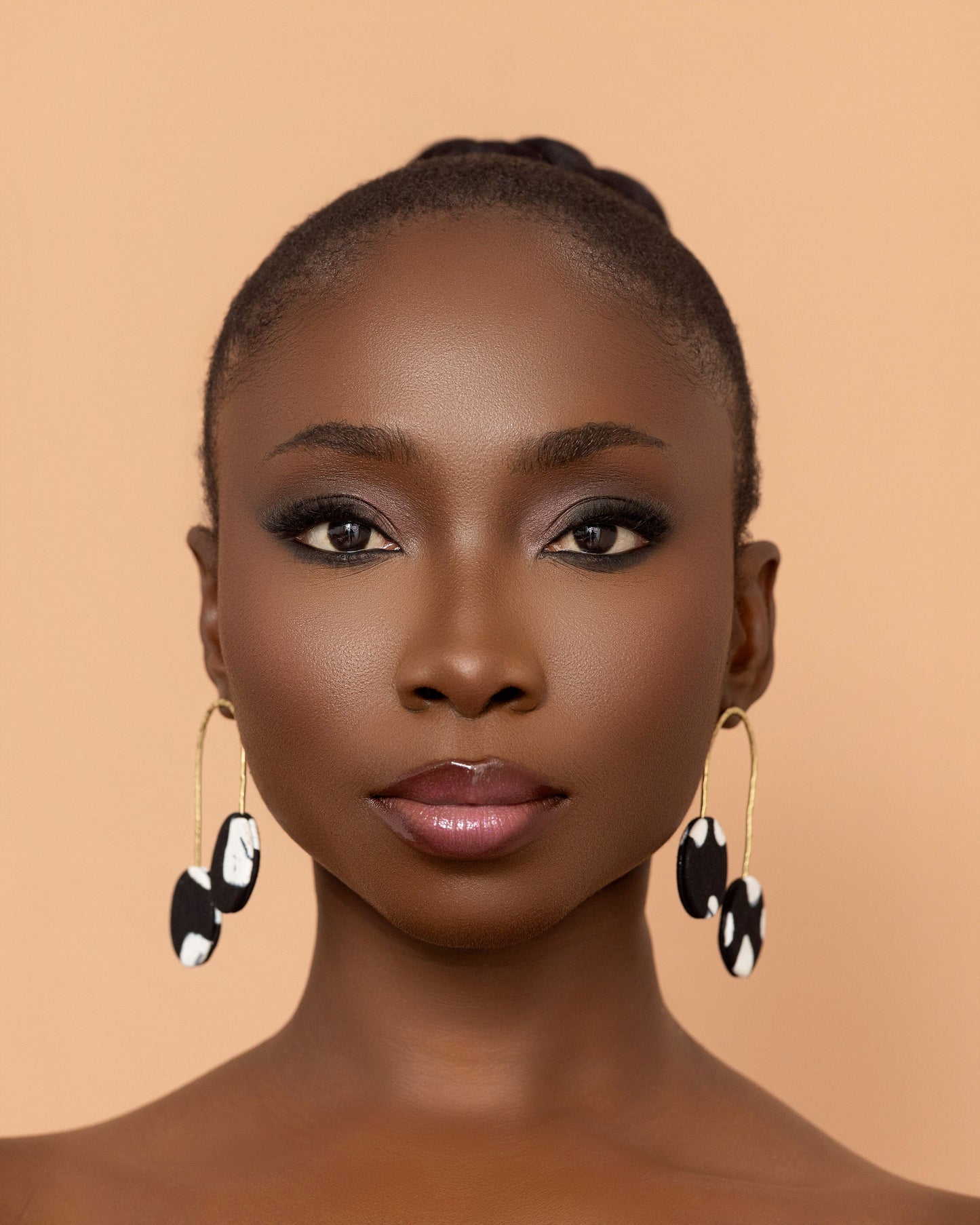 Lightweight handmade black African print earrings crafted in Ghana